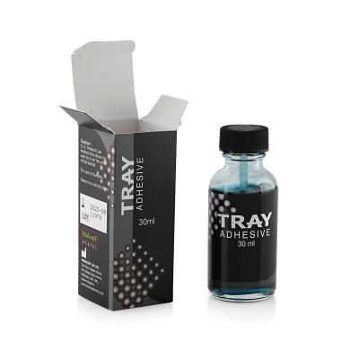 TRAY ADHESIVE